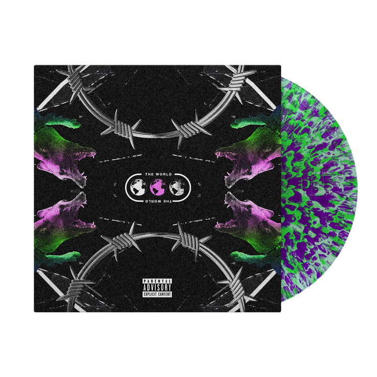Image of a black vinyl sleeve with a coke bottle clear, with purple cloud and green splatter vinyl sticking halfway out of it. The vinyl sleeve is for the band "the world" self titled album. The album cover features silver barbed wire in a semi-circle, mirroring each other, one at the top and one at the bottom of the cover. In between the two barbed wires are four dogs with bared teeth- looking at one another. The center says the word and has 3 globes in a white, pink, white pattern.