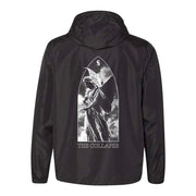 Image of the back of a black windbreaker against a white background. The back has an image of a statue with wings, in the clouds. Above its head is an S logo in white. Below the statue in white outlined text reads "the collapse".