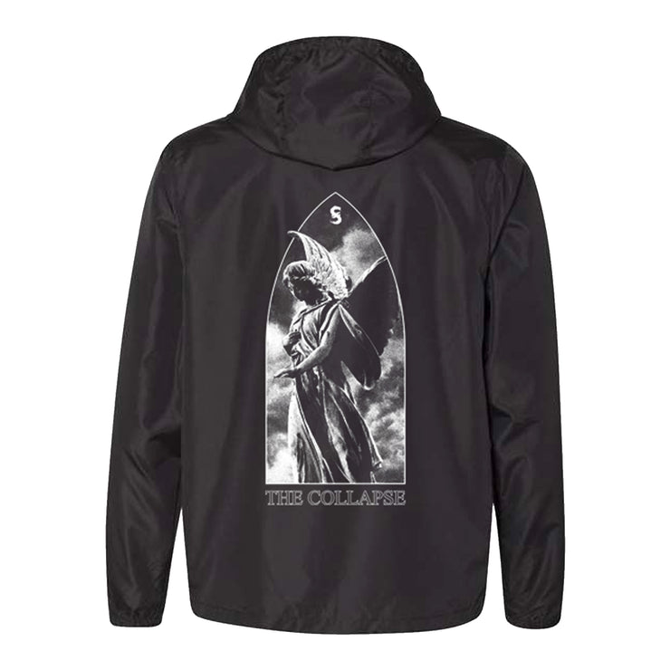 Image of the back of a black windbreaker against a white background. The back has an image of a statue with wings, in the clouds. Above its head is an S logo in white. Below the statue in white outlined text reads "the collapse".