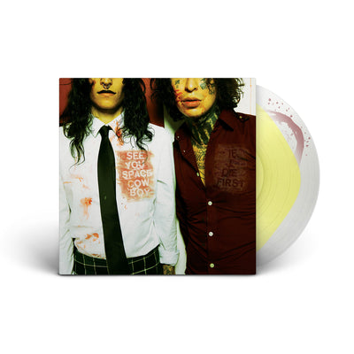 Vinyl sleeve with clear with highlighter yellow color vinyl sticking out of the sleeve against white background. The album cover has an image of two people photographed from the waist to their noses facing the camera. one wears a button up with a tie and the other a button up with a few buttons unbuttoned. The shirt of the person on the left says see you space cowboy. the shirt of the person on the right says if i die first.